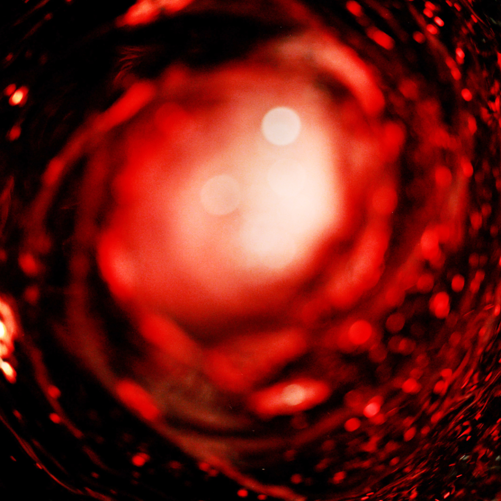 Detail of red wine whirl