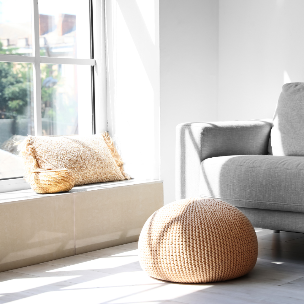 Interior of Light Living Room with Pouf