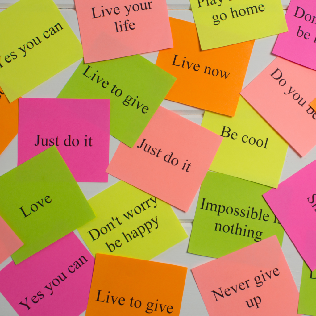 Motivational words on colorful stickers on white background. A vision Board. Cards with words. Affirmation, development, training, seminar. Plan, strategy, to-do list, concept. Creativity, project