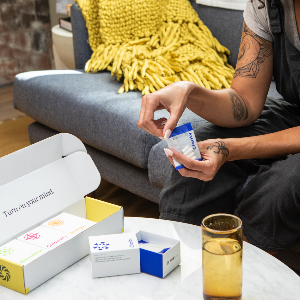 A Woman Taking Health Supplements at Home