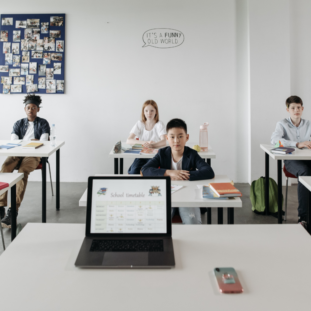 Students Inside a Classroom Listening Attentively