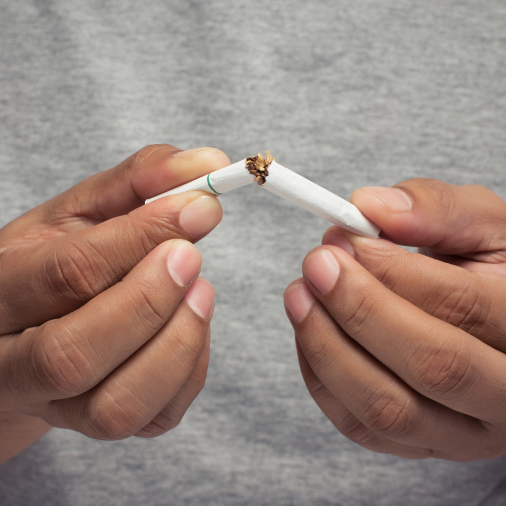 Man hand crushing cigarette.