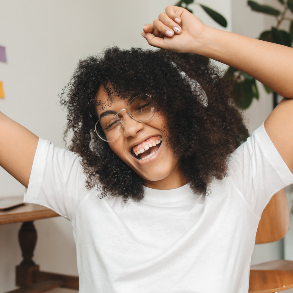 Smiling Woman Listening to Music