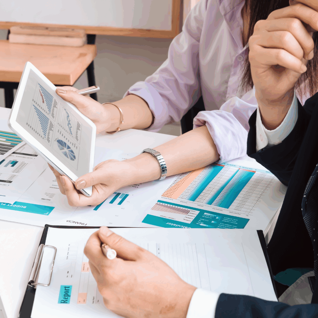 Business Adviser Analyzing and Discussing the Documents