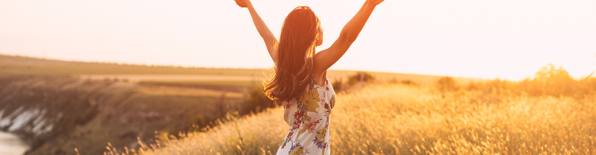 Back view of free Happy Woman Enjoying Nature.