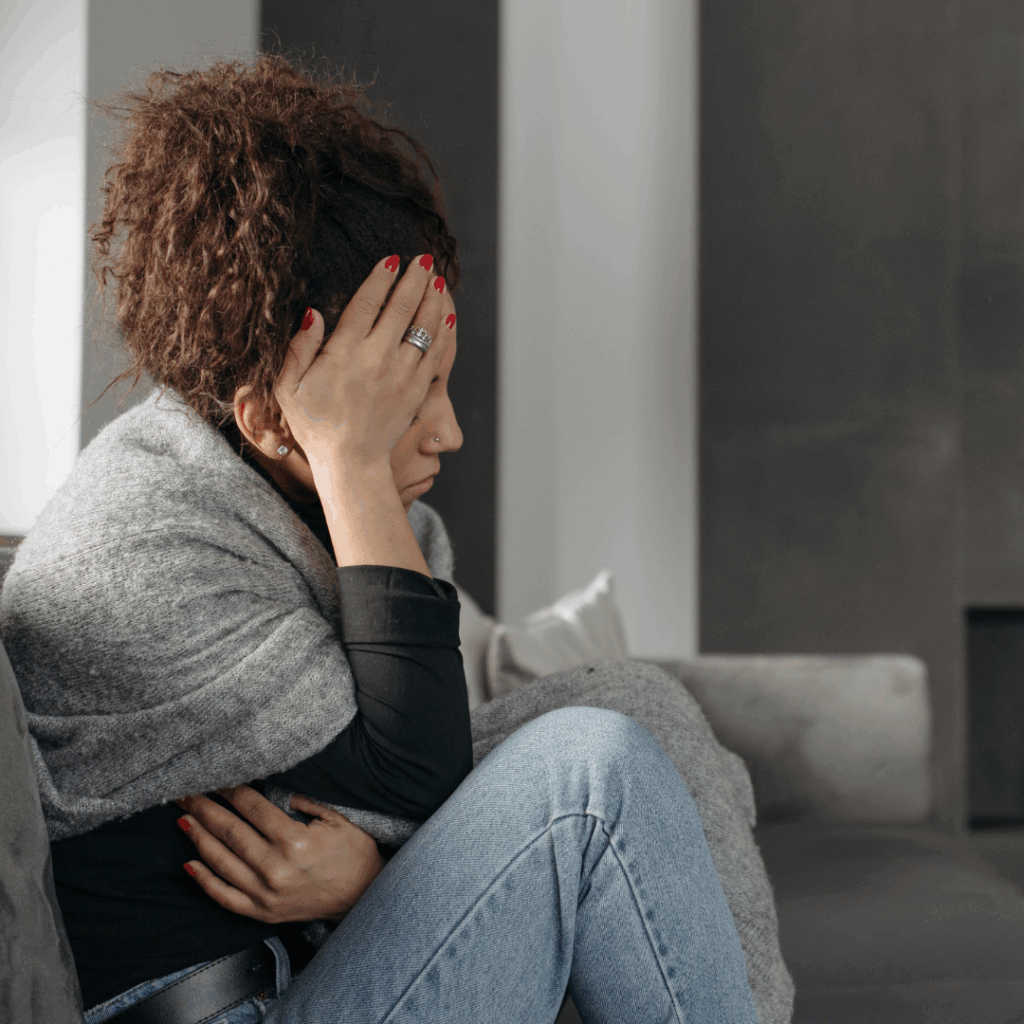 Woman Touching Her Head