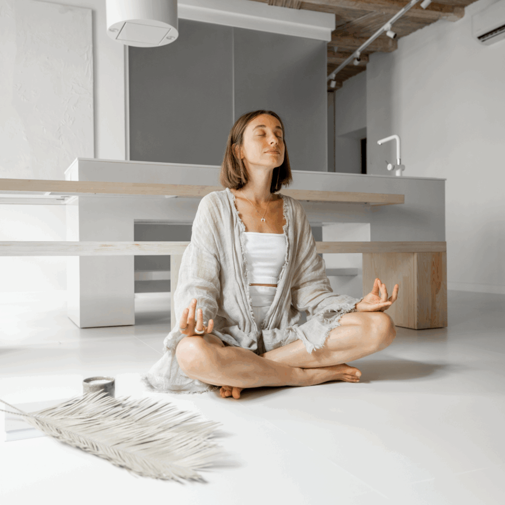 Woman Meditating at Home