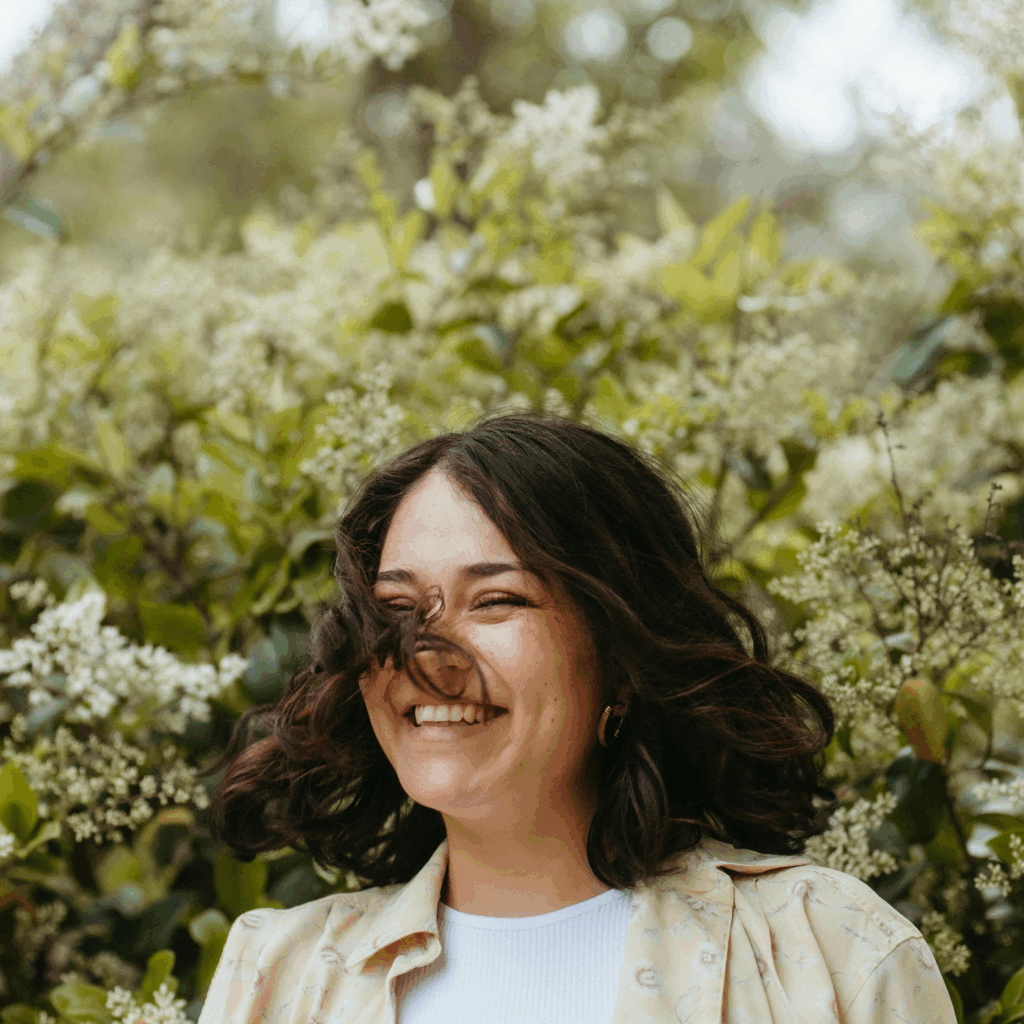 Happy woman enjoying nature in spring