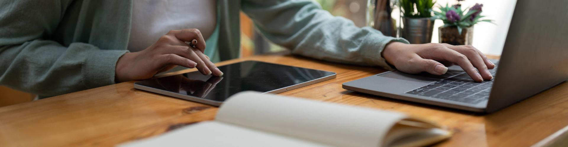 Asian woman writing making list taking notes in notepad and