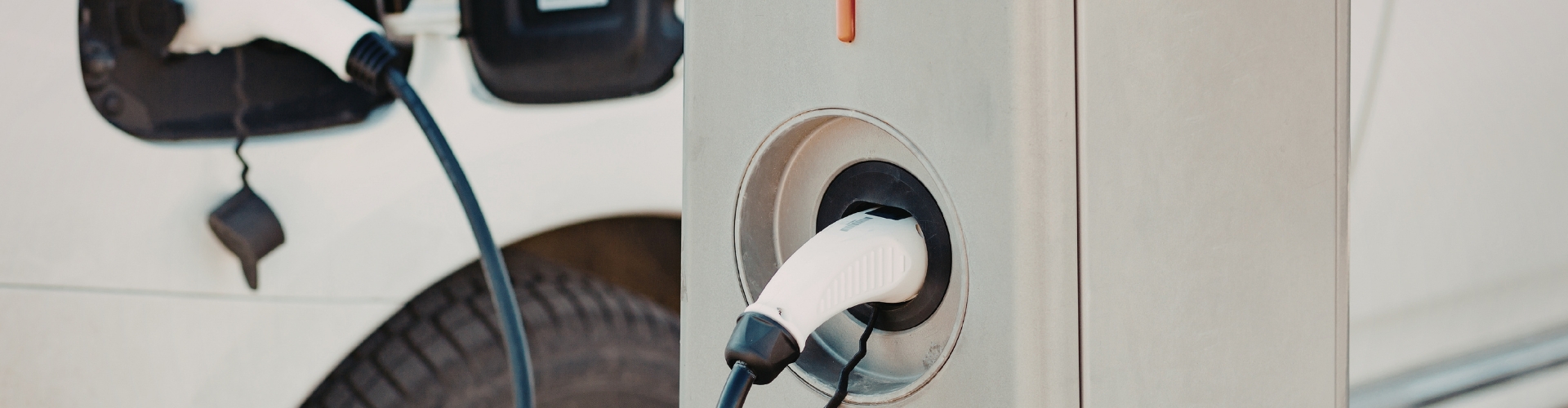 Electric vehicle charging at station