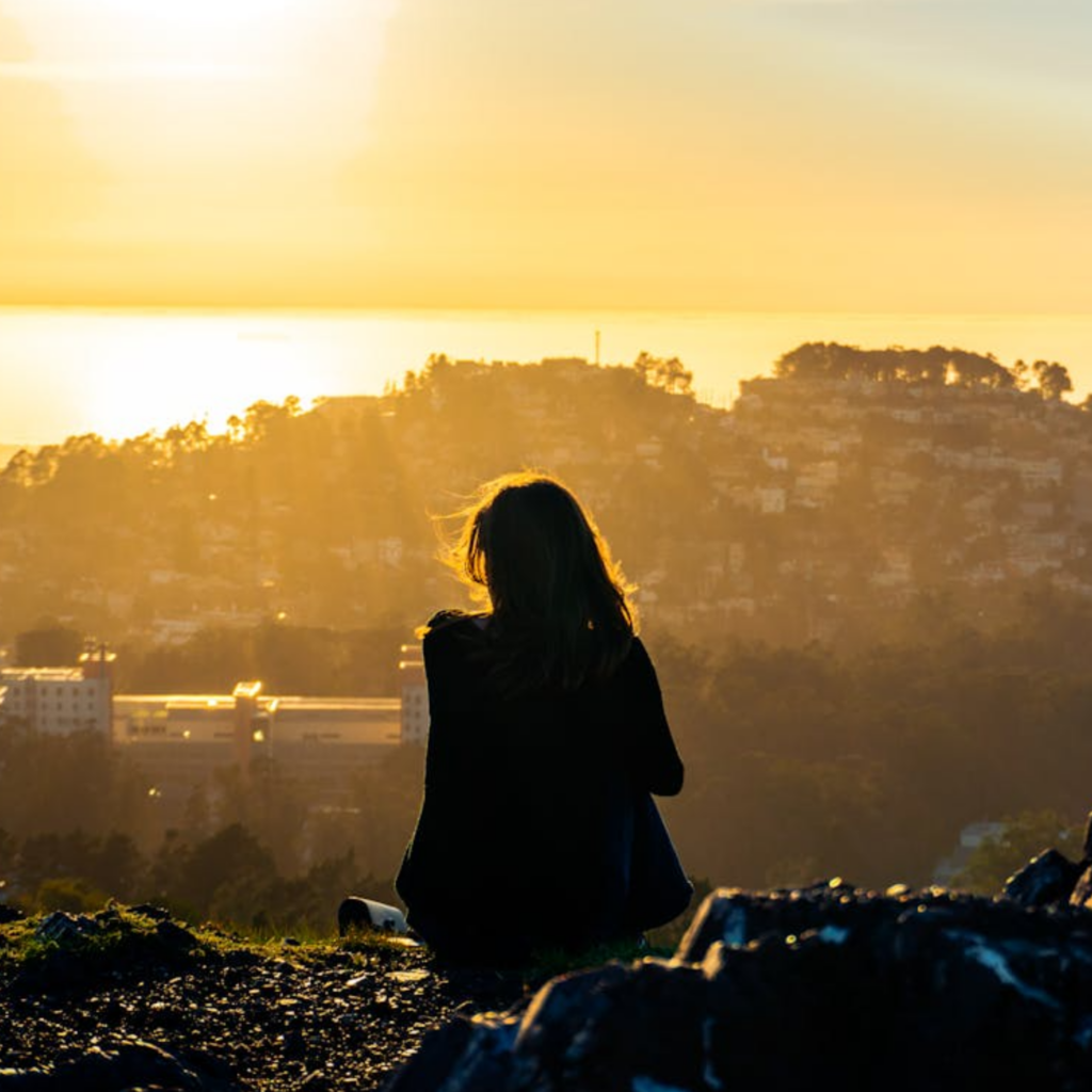 Silhouette of Person Admiring San Francisco Sunset